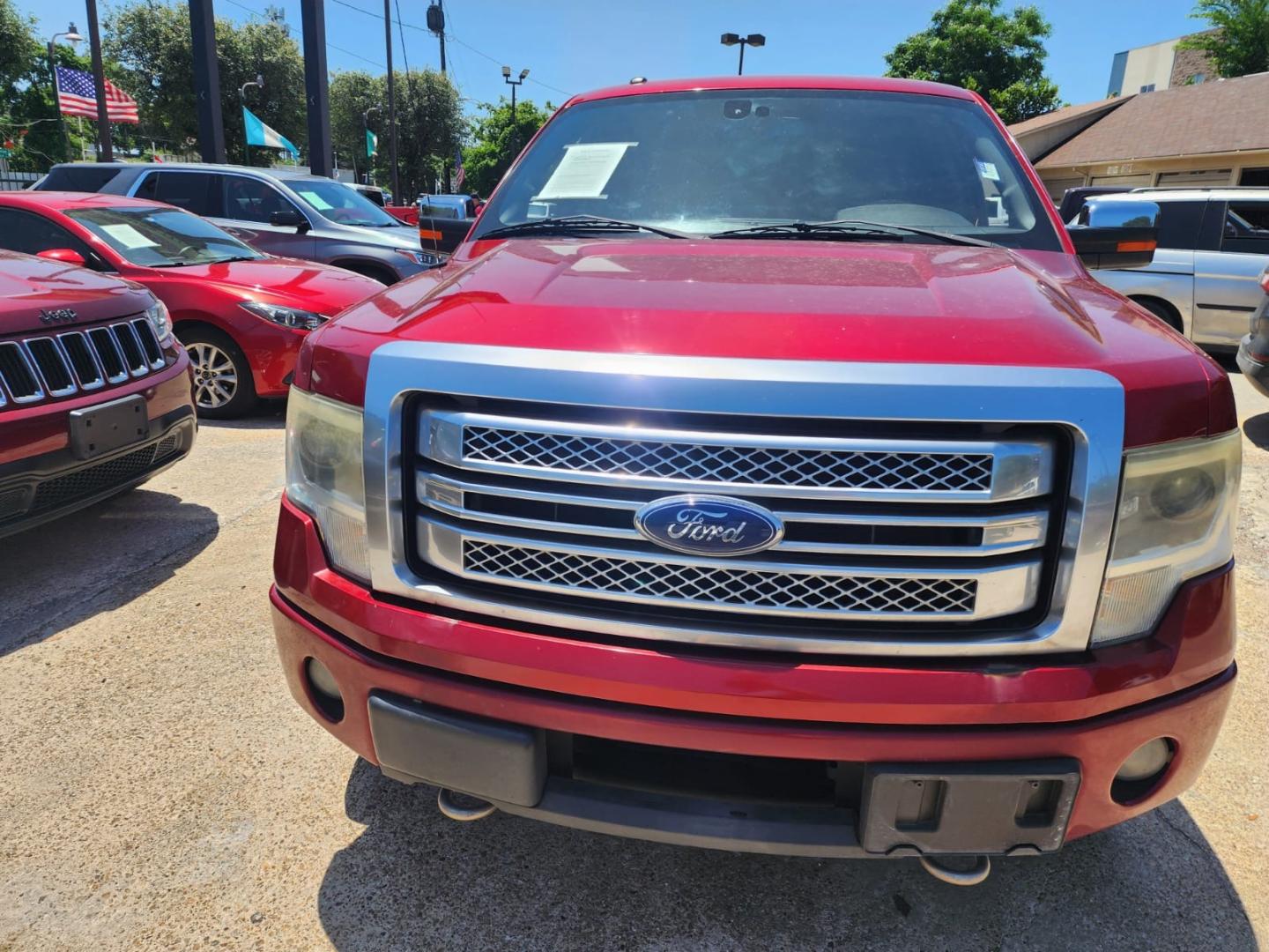 2013 Red Ford F-150 XLT SuperCrew 6.5-ft. Bed 4WD (1FTFW1ET0DF) with an 3.5L V6 TURBO engine, 6-Speed Automatic transmission, located at 945 E. Jefferson Blvd, Dallas, TX, 75203, (214) 943-7777, 32.752514, -96.811630 - Photo#1